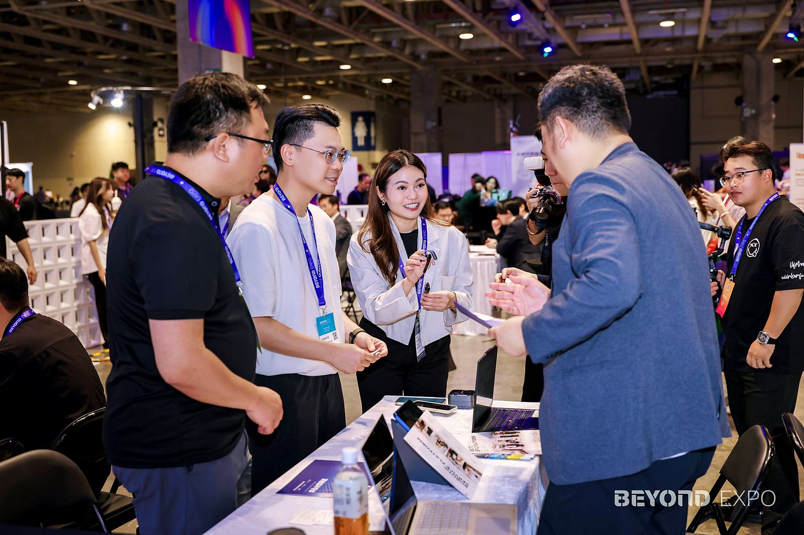 Shi Hui facilitating business matching at a conference
